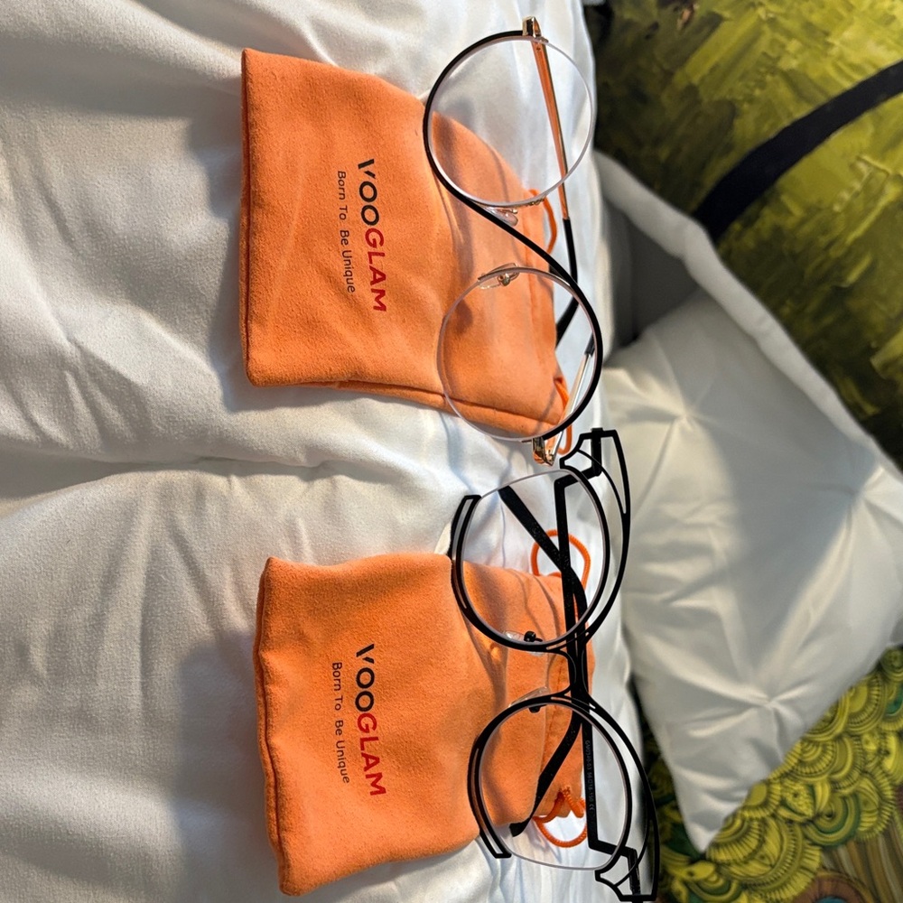 2 pair Vooglam readers. 1.50 strength.